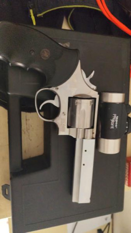 Se vende Revolver S&W mod 686-3 en calibre 357mg con visor tasco pro point.Precio 450 eur. IMG-20250514-WA0000.jpg 01