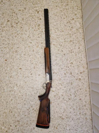 Hola un compañero vende su escopeta de tiro al plato 
Por dejar afición 
La escopeta es una Perazzi MX8 00