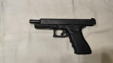 Vendo pistola Glock 34 Gen3, calibre 9x19 Parabellum, guiada en F,  con algunos accesorios para IPSC:

 11