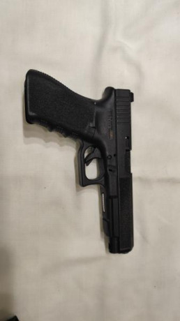 Vendo pistola Glock 34 Gen3, calibre 9x19 Parabellum, guiada en F,  con algunos accesorios para IPSC:

 21