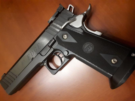 Vendo STI Edge del calibre 9 milímetros más kit del 22 el kit del veintidós está por estrenar ni un solo 01