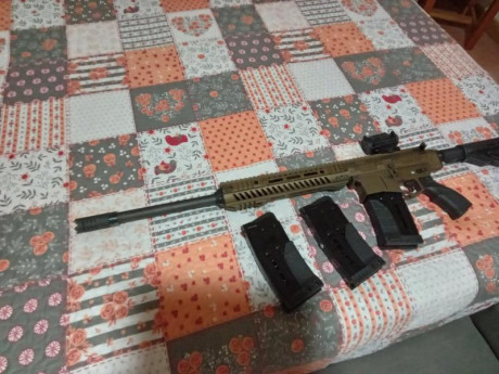 Buenas vendo escopeta UTAS XTR12 en color bronce con 3 cargadores con capacidad de 5 cartuchos 2 y uno 00