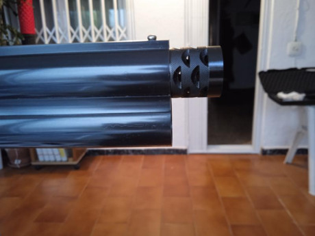 Vendo FN superpuesta  cal.12/76 modelo B525  caza serie one superligera; excelente estado, apenas se ha 00