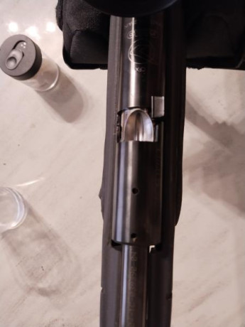 Modificada,buscando maxima presicion,cañon, enfundado en fibra de carbono y culata recortados,guias de 21