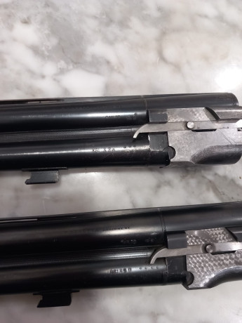 Superpuesta Beretta S56E calibre 12,  monogatillo selector, explusora, con dos juegos de cañones: 4/2 00