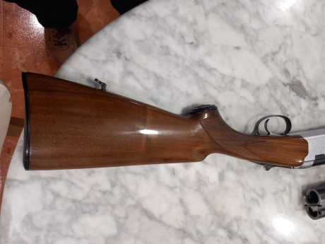 Superpuesta Beretta S56E calibre 12,  monogatillo selector, explusora, con dos juegos de cañones: 4/2 11