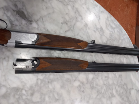 Superpuesta Beretta S56E calibre 12,  monogatillo selector, explusora, con dos juegos de cañones: 4/2 10