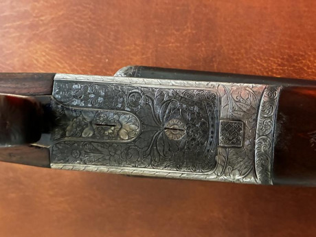 Media pletina, gatillos articulados, cañones de 63,5cms, expulsora, no tiene holguras, buen estado en 52