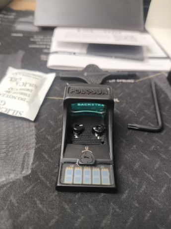 Vendo visor exclusivo para montarse en Glock, no necesita placa ni necesita cambiar la altura de las miras 00