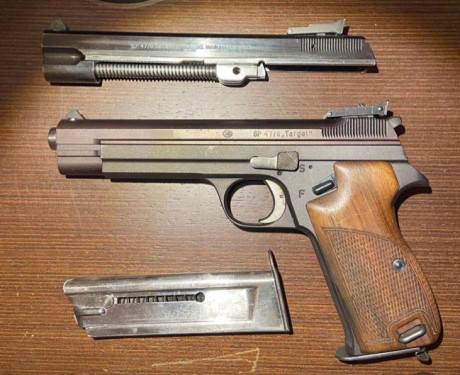 Vendo pistola SIG P210, con carro de 22 y 9mm, perfecto estado.
Tel. 677703019 Roberto La pistola esta 00