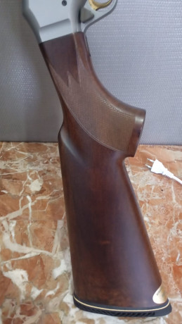 Cambio Browning Phoenix,con dos cajas de cartuchos tiradas......Cambio por escopeta de plato....Está en 01