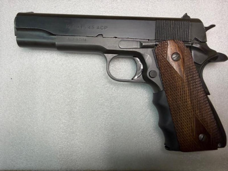 Pistola NORINCO calibre 45ACP, muelles nuevos y gatillo ajustado, con maletín y dos cargadores, en muy 01