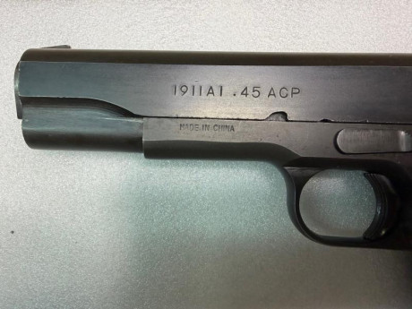 Pistola NORINCO calibre 45ACP, muelles nuevos y gatillo ajustado, con maletín y dos cargadores, en muy 00