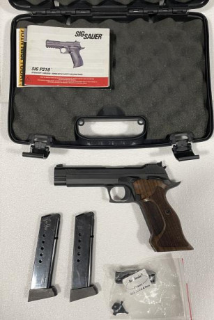Vendo sig sauer P210 impecable, sin ningún rasguño, 2 cargadores monohilera y maletín original. Muy poco 00