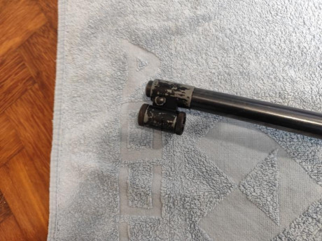 En buen estado, disparando balun de 0,48 g a +_ 180 m/s, unos 7.76 julios.

Tene marcas de uso leves en 22