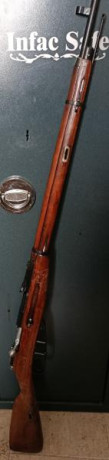 Fusil Mosin Nagant modelo 91/30, estado metal muy bueno, maderas con marcas de uso, no se ha restaurado, 00