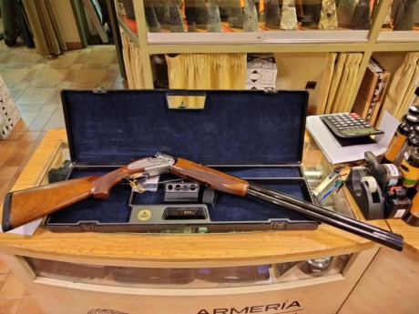 Para quien le interese una escopeta del 12 Lamber de plato cañones de 76cm ventilador. Espulsora de un 01