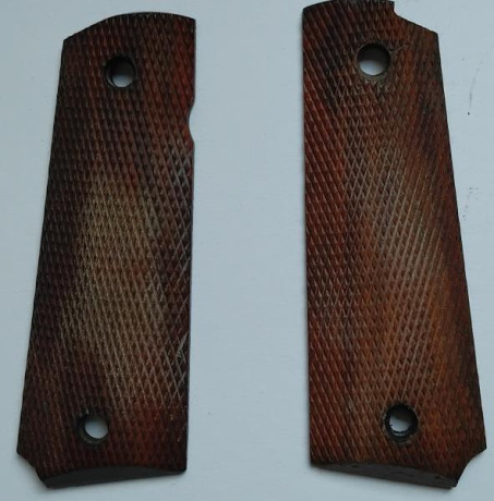 Vendo cachas madera  pistola 1911, precio 20€ con los portes incluidos dentro de la península (envío por 00