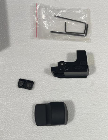 Vendo sistema punto rojo CAT SM2 para Glock, es el conjunto completo, base magnética con alza y punto 02