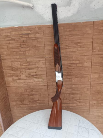 Un amigo vende una escopeta superpuesta Laurona Sporting  con 71cm de cañón con una y tres estrellas fijas 02