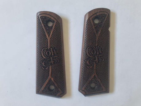 Se vende cachas de madera para pistola COLT 1911 nuevas. Precio 40 euros. Tlf.607609326 01