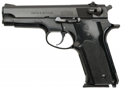 Se vende por no usar una mítica pistola que marcó una época.
S&W modelo 59 
1 cargador y maletín no 00