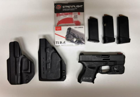 Glock 26 Gen 3. Se incluye 3 cargadores (dos de 10+ 2 y uno de 10), punto de mira de fibra roja, una funda 01