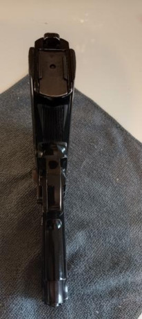 Se vende por no usar una mítica pistola que marcó una época.
S&W modelo 59 
1 cargador y maletín no 31