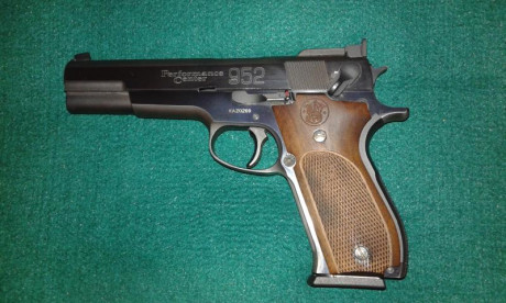 Cambio Smith & Wesson 9m/m por replica revolver cartucho metálico con certificado libro coleccionista, 00