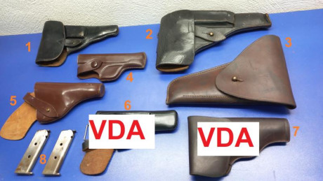 Se ofrecen las siguientes  Fundas  Cuero Originales y un par de cargadores  de armas cortas.

Desconozco 00