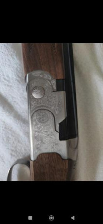 Un amigo vende Beretta silver pigeon 1 con 10 tiros pegados tres polichoques sin estrenar con su maletín 01