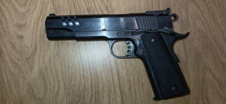 Buenas!  un amigo mío pone a la venta su Norinco 1911  A1 sport speedy slide del .45 ACP  en perfecto 01