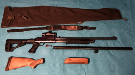 Vendo escopeta de corredera MOSSBERG 500 calibre 12/76 con dos cañones; uno liso de 71 cm con chokes intercambiables 02