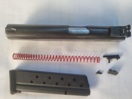 Se vende kit de 9 mm. Parabellum NORINCO para pistola 1911, cargador y alza regulable de un solo uso. 00