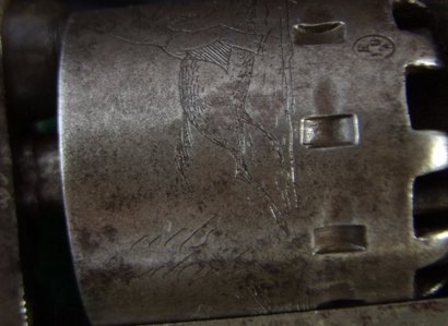 Este revolver, fabricado en Belgica bajo licencia y patentes varias de Colt por L.Ghaye, es unico con 02