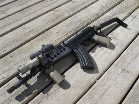 Hola, alguien tiene un CZ58, ¿que tal la precision a 50/100 m? 131