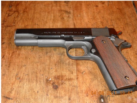   Amigos mios a mis manos llego una 1911 de manos de un amigo que la restauro por el que se que esta repavonada 00
